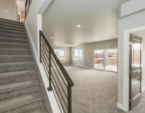 Stairwell and empty remodeled basement